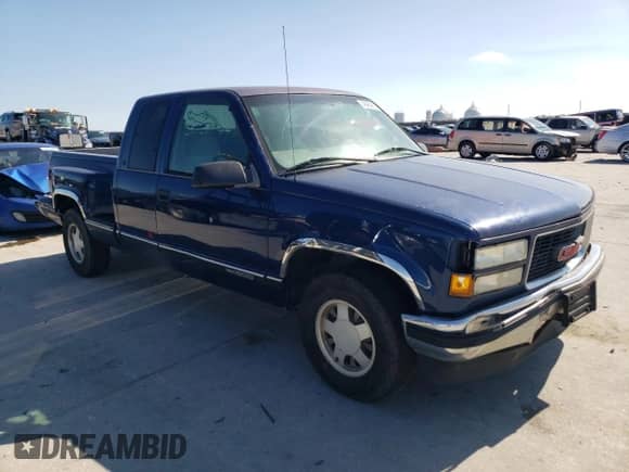 1998 GMC Sierra 1500 с VIN 2GTEC19R0W1547075, выставлен на аукционе Copart как лот 46464865 с пробегом 209 425 миль миль и Списание • Salvage title. История ставок и продаж доступна на DreamBid. Изображение 4.