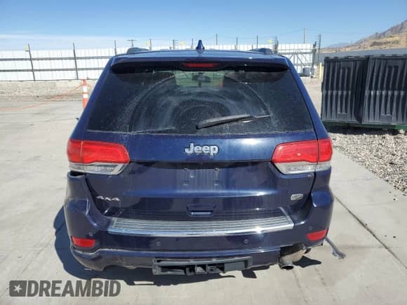 2016 Jeep Grand Cherokee Overland with VIN 1C4RJFCG2GC350920, listed as a Copart auction lot 80224945 with 141,409 mi miles and Salvage title. Bid and sale history available at DreamBid. Image 6.
