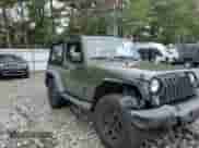 2015 Jeep Wrangler Willys Wheeler z VIN 1C4AJWAG7FL745593, wystawiony jako Copart lot #83771385 z przebiegiem 114 326 mil mil oraz Szkoda całkowita • Salvage title. Historia ofert i sprzedaży dostępna na DreamBid. Obrazek 14.