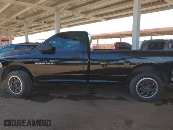 2012 Ram 1500 z VIN 3C6JD7DPXCG259725, wystawiony jako IAAI lot #42409076 z przebiegiem 186 458 mil mil oraz . Historia ofert i sprzedaży dostępna na DreamBid. Obrazek 14.