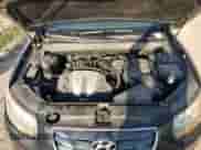 2010 Hyundai Santa Fe Limited с VIN 5NMSKDAG6AH359683, выставлен на аукционе Copart как лот 66179444 с пробегом 234 803 миль миль и Списание • Salvage title. История ставок и продаж доступна на DreamBid. Изображение 13.