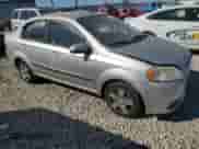 2011 Chevrolet Aveo 1LT with VIN KL1TD5DE4BB142595, listed as a Copart auction lot 73681244 with 142,436 mi miles and Salvage title. Bid and sale history available at DreamBid. Image 4.