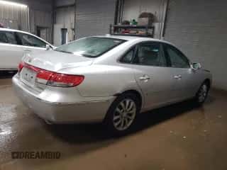 2008 Hyundai Azera Limited с VIN KMHFC46F38A256333, выставлен на аукционе Copart как лот 85846614 с пробегом 121 860 миль миль и Списание • Salvage title. История ставок и продаж доступна на DreamBid. Изображение 3.