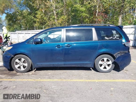 2011 Toyota Sienna LE AAS with VIN 5TDKK3DC9BS152691, listed as a IAAI auction lot 43419664 with 302,239 mi miles and . Bid and sale history available at DreamBid. Image 14.