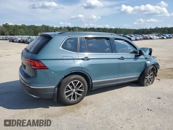 2021 Volkswagen Tiguan SE с VIN 3VV3B7AX8MM103795, выставлен на аукционе Copart как лот 69850945 с пробегом 74 585 миль миль и Списание • Salvage title. История ставок и продаж доступна на DreamBid. Изображение 3.