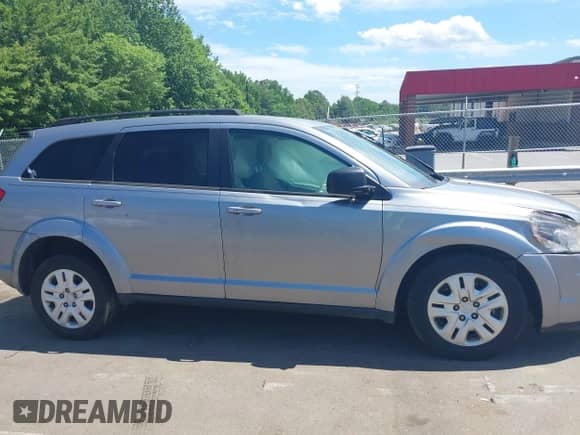 2019 Dodge Journey SE Value with VIN 3C4PDCAB7KT870550, listed as a IAAI auction lot 42327883 with 128,002 mi miles and . Bid and sale history available at DreamBid. Image 13.
