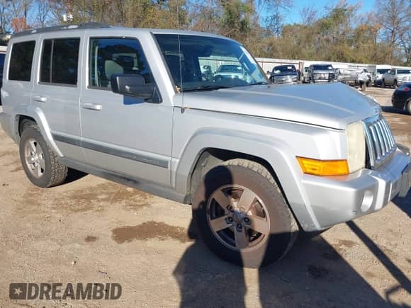 2007 Jeep Commander Sport with VIN 1J8HH48K77C587615, listed as a IAAI auction lot 41149777 with 167,871 mi miles and . Bid and sale history available at DreamBid. Image 1.