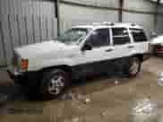 1995 Jeep Grand Cherokee Laredo with VIN 1J4GZ58S6SC630947, listed as a Copart auction lot 82143564 with 267,946 mi miles and Salvage title. Bid and sale history available at DreamBid. Image 1.