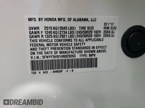 2017 Honda Pilot Touring z VIN 5FNYF5H91HB029263, wystawiony jako Copart lot #64412575 z przebiegiem 111 645 mil mil oraz Szkoda całkowita • Salvage title. Historia ofert i sprzedaży dostępna na DreamBid. Obrazek 13.