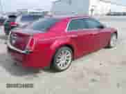 2014 Chrysler 300 C with VIN 2C3CCAEG3EH355185, listed as a IAAI auction lot 41765179 with 243,059 mi miles and . Bid and sale history available at DreamBid. Image 4.