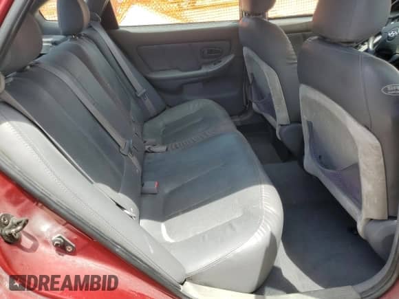 2004 Hyundai Elantra GT z VIN KMHDN56DX4U121512, wystawiony jako Copart lot #65407965 z przebiegiem 70 744 mil mil oraz Szkoda całkowita • Salvage title. Historia ofert i sprzedaży dostępna na DreamBid. Obrazek 10.