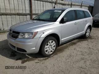 2014 Dodge Journey SE with VIN 3C4PDCAB7ET280899, listed as a Copart auction lot 81166595 with 136,991 mi miles and Clean title. Bid and sale history available at DreamBid. Image 1.