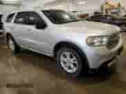 2011 Dodge Durango Express with VIN 1D4RE2GG1BC617239, listed as a Copart auction lot 63838765 with 180,552 mi miles and Salvage title. Bid and sale history available at DreamBid. Image 4.