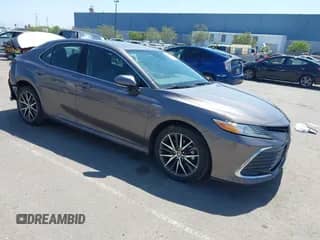 2021 Toyota Camry Hybrid XLE with VIN 4T1F31AK9MU560049, listed as a IAAI auction lot 42211169 with 182,185 mi miles and . Bid and sale history available at DreamBid. Image 1.