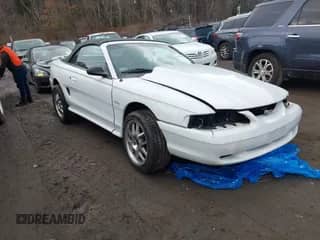 1996 Ford Mustang GT z VIN 1FALP45X7TF201553, wystawiony jako IAAI lot #41487690 z przebiegiem 102 015 mil mil oraz . Historia ofert i sprzedaży dostępna na DreamBid. Obrazek 1.