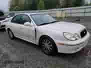 2002 Hyundai Sonata GLS with VIN KMHWF35HX2A561744, listed as a Copart auction lot 68923905 with 139,568 mi miles and Salvage title. Bid and sale history available at DreamBid. Image 4.