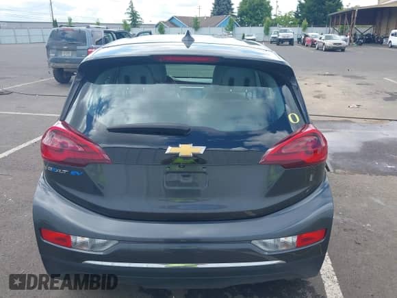 2021 Chevrolet Bolt EV LT z VIN 1G1FY6S01M4111120, wystawiony jako IAAI lot #42294119 z przebiegiem 42 950 mil mil oraz . Historia ofert i sprzedaży dostępna na DreamBid. Obrazek 17.