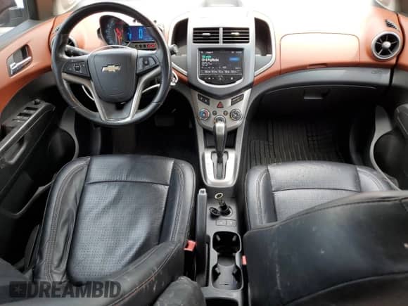 2013 Chevrolet Sonic LTZ с VIN 1G1JE5SH0D4102525, выставлен на аукционе Copart как лот 60976595 с пробегом 138 420 миль миль и Списание • Salvage title. История ставок и продаж доступна на DreamBid. Изображение 8.