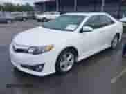 2014 Toyota Camry SE with VIN 4T1BF1FK4EU739728, listed as a IAAI auction lot 43381322 with 218,010 mi miles and . Bid and sale history available at DreamBid. Image 2.