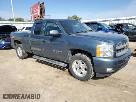 2013 Chevrolet Silverado 1500 LTZ with VIN 1GCRKTE7XDZ372908, listed as a Copart auction lot 81836595 with 74,456 mi miles and Salvage title. Bid and sale history available at DreamBid. Image 4.