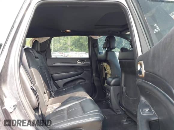 2014 Jeep Grand Cherokee Limited with VIN 1C4RJFBG0EC155414, listed as a IAAI auction lot 42882845 with 118,576 mi miles and . Bid and sale history available at DreamBid. Image 8.