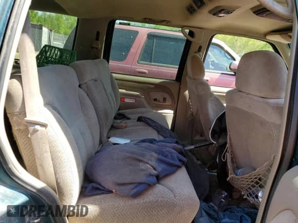 1999 Chevrolet Tahoe with VIN 1GNEC13R2XJ536828, listed as a Copart auction lot 53610465 with 201,276 mi miles and Salvage title. Bid and sale history available at DreamBid. Image 11.