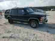 1999 Chevrolet Tahoe Z71 z VIN 1GNEK13R1XJ380316, wystawiony jako Copart lot #68505524 z przebiegiem 242 542 mil mil oraz Szkoda całkowita • Salvage title. Historia ofert i sprzedaży dostępna na DreamBid. Obrazek 11.