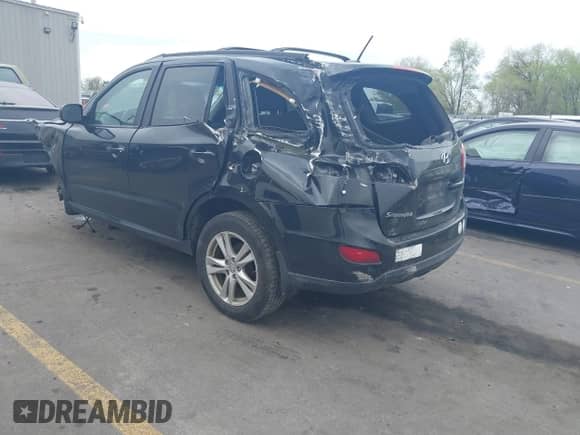 2012 Hyundai Santa Fe SE с VIN 5XYZHDAG5CG145634, выставлен на аукционе IAAI как лот 42039485 с пробегом 177 976 миль миль и . История ставок и продаж доступна на DreamBid. Изображение 3.