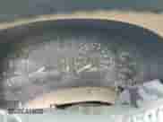 2002 Chevrolet Blazer LS z VIN 1GNCS13W32K122251, wystawiony jako Copart lot #88497015 z przebiegiem Nie podano mil oraz Nie do naprawy • Non repairable. Historia ofert i sprzedaży dostępna na DreamBid. Obrazek 9.