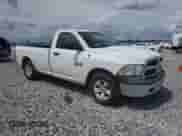 2016 Ram 1500 Tradesman with VIN 3C6JR6DG6GG343509, listed as a Copart auction lot 80655195 with 120,834 mi miles and Salvage title. Bid and sale history available at DreamBid. Image 4.