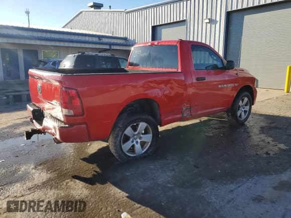 2012 Ram 1500 Express with VIN 3C6JD7AT0CG263039, listed as a Copart auction lot 84575185 with 202,886 mi miles and Salvage title. Bid and sale history available at DreamBid. Image 3.