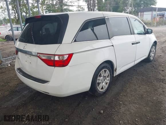 2011 Honda Odyssey LX with VIN 5FNRL5H28BB028618, listed as a IAAI auction lot 43339792 with 144,001 mi miles and . Bid and sale history available at DreamBid. Image 4.