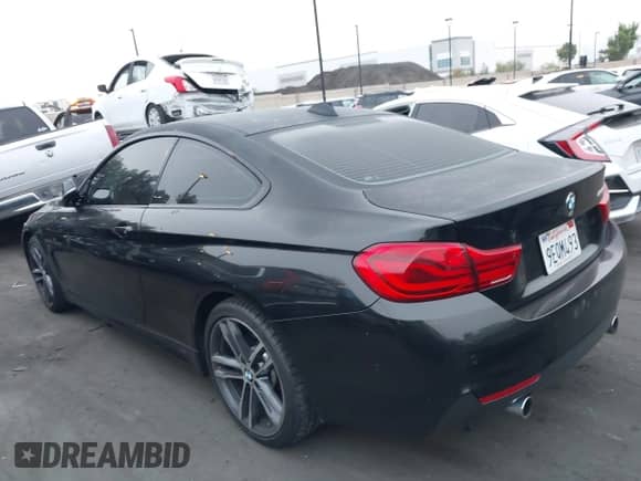 2018 BMW 4 Series 440i with VIN WBA4W7C56JAB93721, listed as a IAAI auction lot 43181725 with 91,507 mi miles and . Bid and sale history available at DreamBid. Image 14.