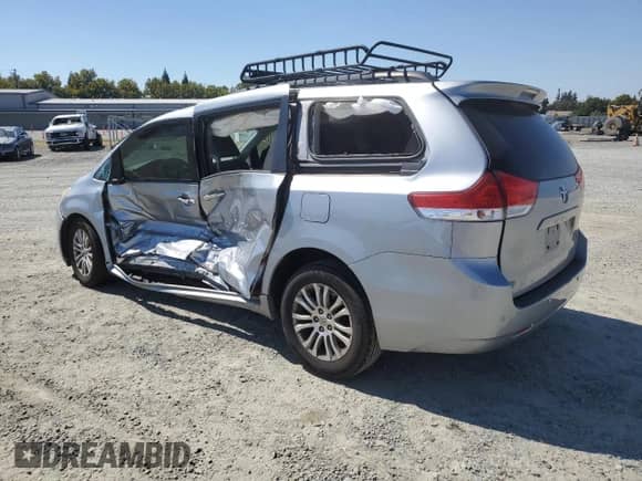 2013 Toyota Sienna XLE AAS with VIN 5TDYK3DC4DS327183, listed as a Copart auction lot 70894995 with Not provided miles and Salvage title. Bid and sale history available at DreamBid. Image 2.