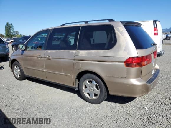 2000 Honda Odyssey EX with VIN 2HKRL1863YH571364, listed as a Copart auction lot 81698305 with 235,316 mi miles and Salvage title. Bid and sale history available at DreamBid. Image 2.