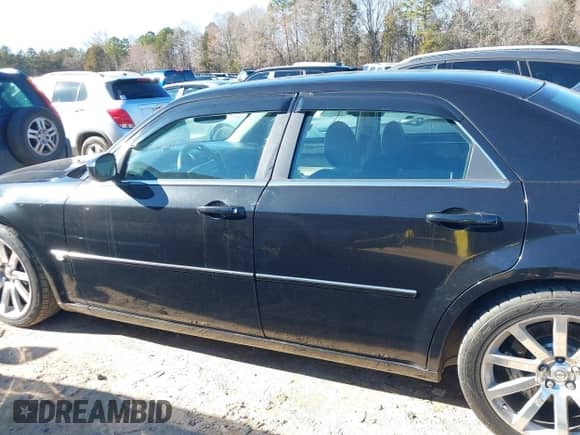 2006 Chrysler 300 C SRT-8 with VIN 2C3LA73W06H216409, listed as a IAAI auction lot 41588832 with 187,662 mi miles and . Bid and sale history available at DreamBid. Image 14.