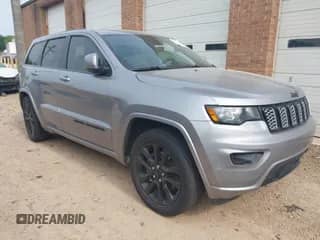 2021 Jeep Grand Cherokee Laredo E with VIN 1C4RJEAG0MC625113, listed as a IAAI auction lot 42280310 with 56,111 mi miles and . Bid and sale history available at DreamBid. Image 1.