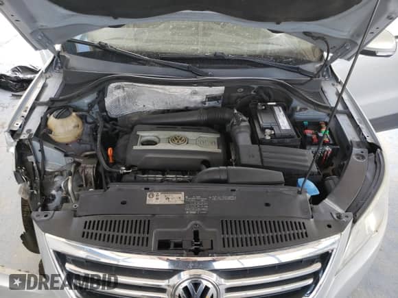 2009 Volkswagen Tiguan SE с VIN WVGBV75N69W525304, выставлен на аукционе Copart как лот 69112395 с пробегом 115 919 миль миль и Списание • Salvage title. История ставок и продаж доступна на DreamBid. Изображение 12.