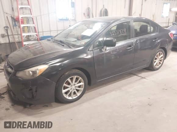 2013 Subaru Impreza Premium with VIN JF1GJAC65DH027189, listed as a IAAI auction lot 42331824 with 141,389 mi miles and . Bid and sale history available at DreamBid. Image 2.