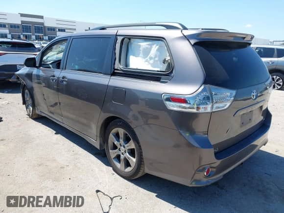 2012 Toyota Sienna SE with VIN 5TDXK3DC5CS232979, listed as a IAAI auction lot 43136504 with 198,231 mi miles and . Bid and sale history available at DreamBid. Image 3.