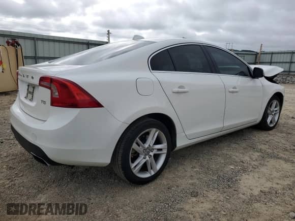 2014 Volvo S60 T5 с VIN YV1612FS2E2272714, выставлен на аукционе Copart как лот 68278845 с пробегом 90 731 миль миль и Списание • Salvage title. История ставок и продаж доступна на DreamBid. Изображение 3.