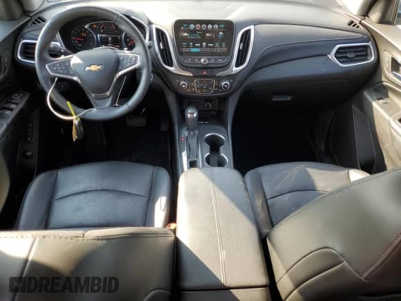 2018 Chevrolet Equinox Premier с VIN 3GNAXWEX0JS543164, выставлен на аукционе Copart как лот 80172865 с пробегом 52 811 миль миль и Списание • Salvage title. История ставок и продаж доступна на DreamBid. Изображение 8.