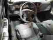 2005 Dodge Dakota SLT z VIN 1D7HW48K15S245809, wystawiony jako Copart lot #76278454 z przebiegiem 213 993 mil mil oraz Czysty tytuł • Clean title. Historia ofert i sprzedaży dostępna na DreamBid. Obrazek 8.