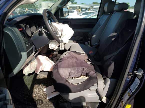 2012 Toyota Tundra z VIN 5TFRU5F17CX027376, wystawiony jako Copart lot #55213385 z przebiegiem 286 149 mil mil oraz Szkoda całkowita • Salvage title. Historia ofert i sprzedaży dostępna na DreamBid. Obrazek 7.