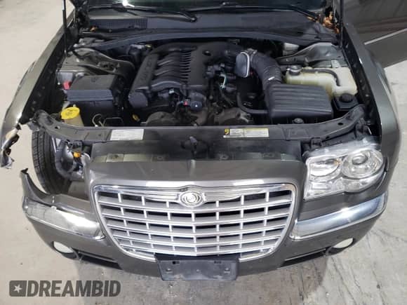 2008 Chrysler 300 Limited с VIN 2C3KA33GX8H126264, выставлен на аукционе Copart как лот 60605105 с пробегом 143 765 миль миль и Списание • Salvage title. История ставок и продаж доступна на DreamBid. Изображение 11.