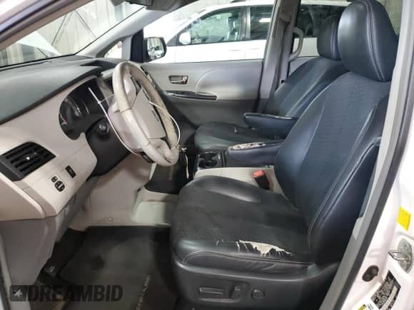 2011 Toyota Sienna SE with VIN 5TDXK3DC4BS093247, listed as a Copart auction lot 67480395 with 252,316 mi miles and Salvage title. Bid and sale history available at DreamBid. Image 7.