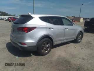2017 Hyundai Santa Fe 2.4L z VIN 5XYZT3LB4HG456926, wystawiony jako IAAI lot #43207286 z przebiegiem 156 221 mil mil oraz . Historia ofert i sprzedaży dostępna na DreamBid. Obrazek 4.