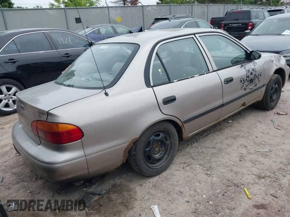 2001 Chevrolet Prizm z VIN 1Y1SK52811Z442006, wystawiony jako IAAI lot #42321680 z przebiegiem Nie podano mil oraz . Historia ofert i sprzedaży dostępna na DreamBid. Obrazek 4.