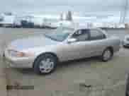 1995 Toyota Camry LE z VIN JT2GK12E4S0086805, wystawiony jako Copart lot #45793885 z przebiegiem 138 015 mil mil oraz Szkoda całkowita • Salvage title. Historia ofert i sprzedaży dostępna na DreamBid. Obrazek 1.