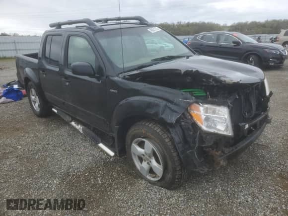 2007 Nissan Frontier LE with VIN 1N6AD07W17C401906, listed as a Copart auction lot 49831275 with 137,696 mi miles and Salvage title. Bid and sale history available at DreamBid. Image 4.